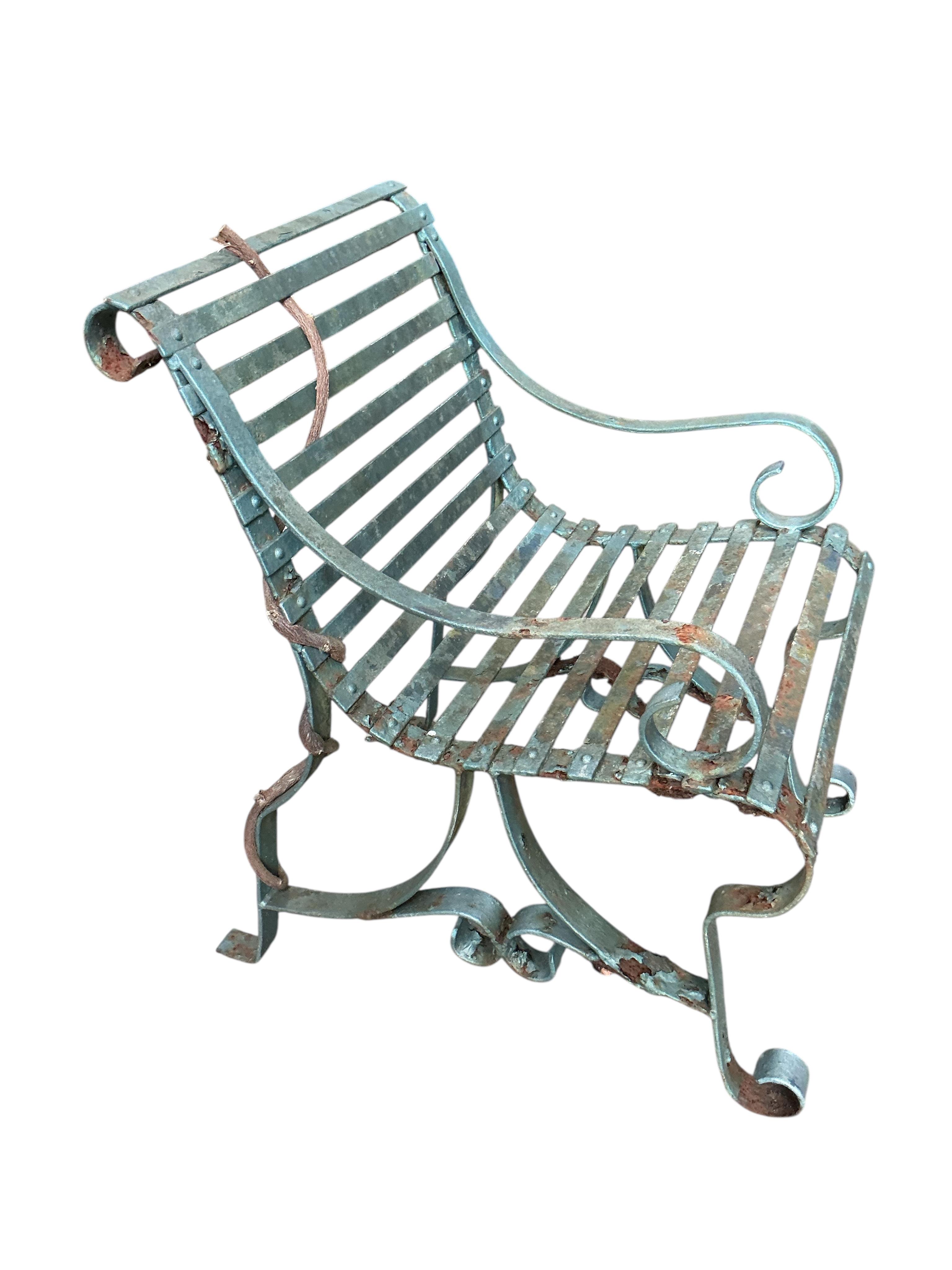 A pair of Victorian painted, wrought iron garden chairs, width 56cm, depth 74cm, height 84cm